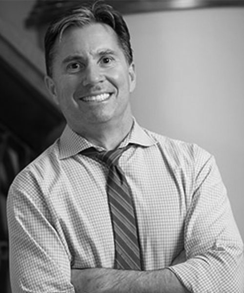 Clinical Mastery Black and White Faculty Headshot of Chris Catalano